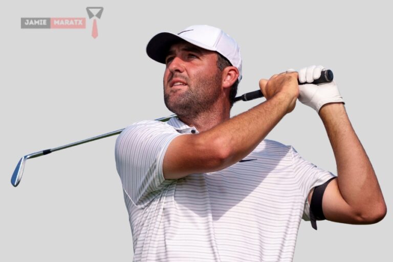 Scottie Scheffler holding a golf club on the course, showcasing his determination and skill, representing his success detailed in the blog post “Scottie Scheffler Net Worth.