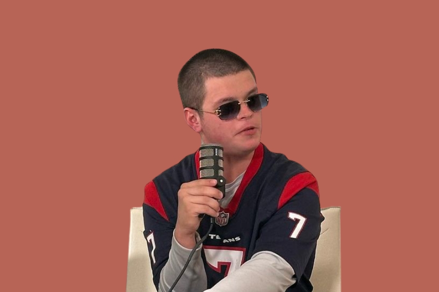 Sketch Streamer speaking during a podcast interview while wearing sunglasses.